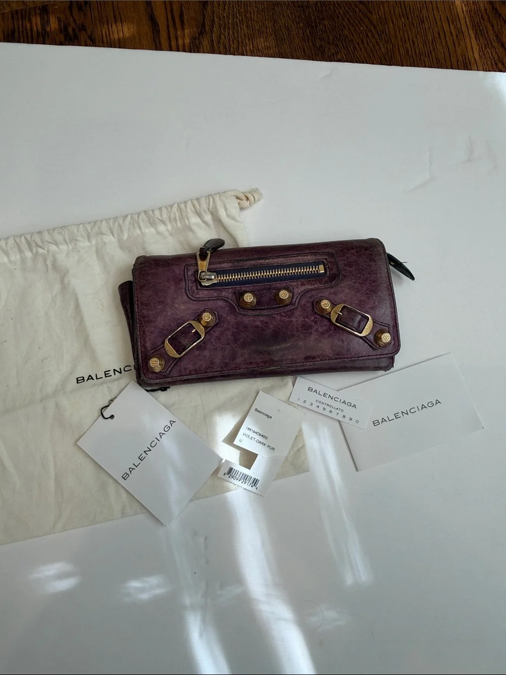 Balenciaga Distressed Plum Leather Continental Wallet with Gold Hardware